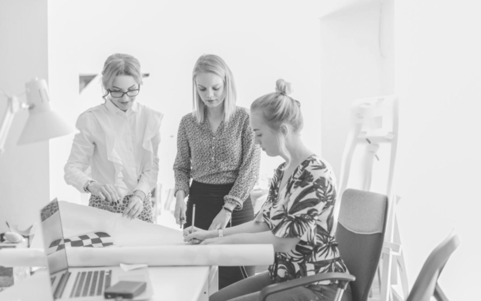 Collaborative partnership meeting discussing financial progress measurement strategies